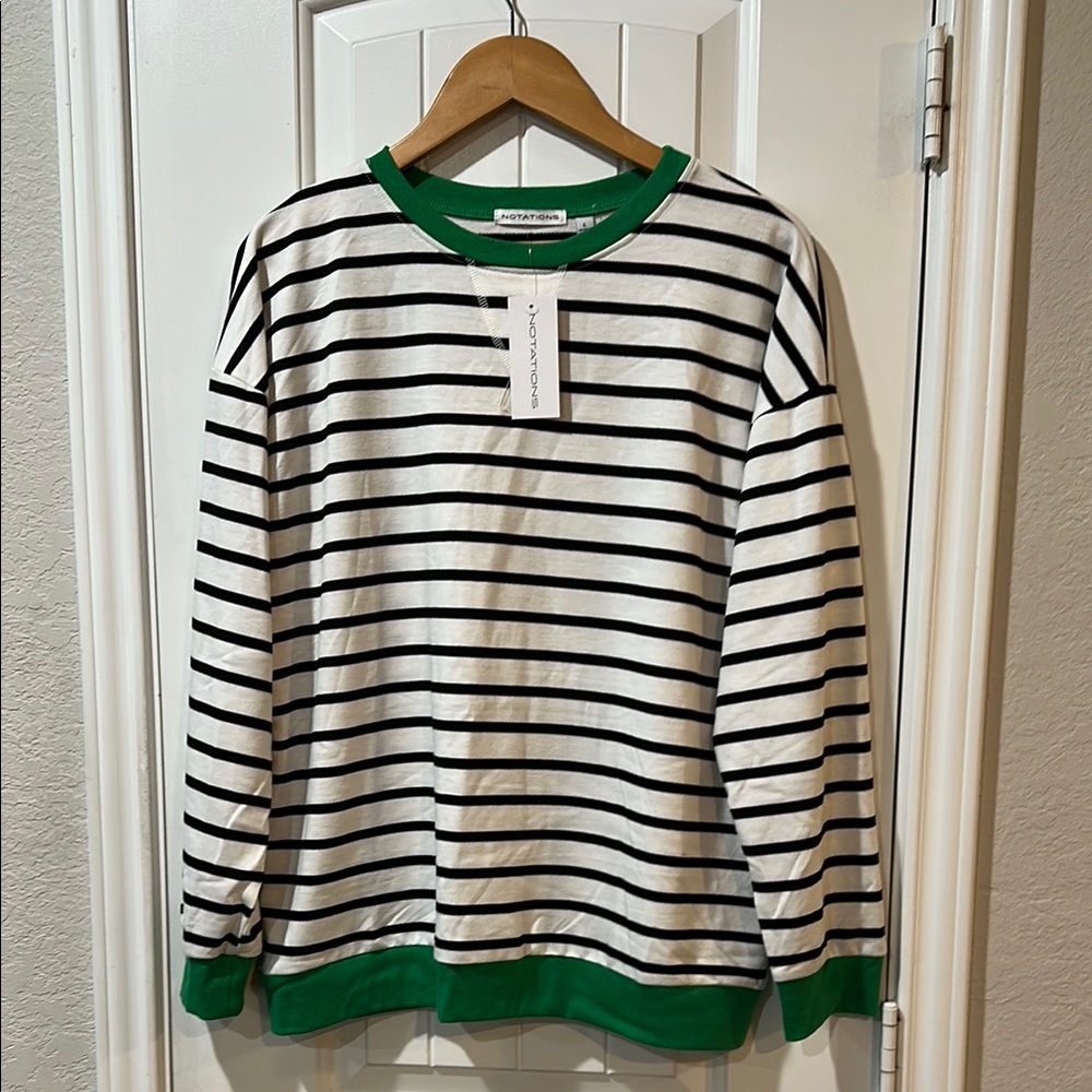 Black and White Striped Sweatshirt with Green Accents